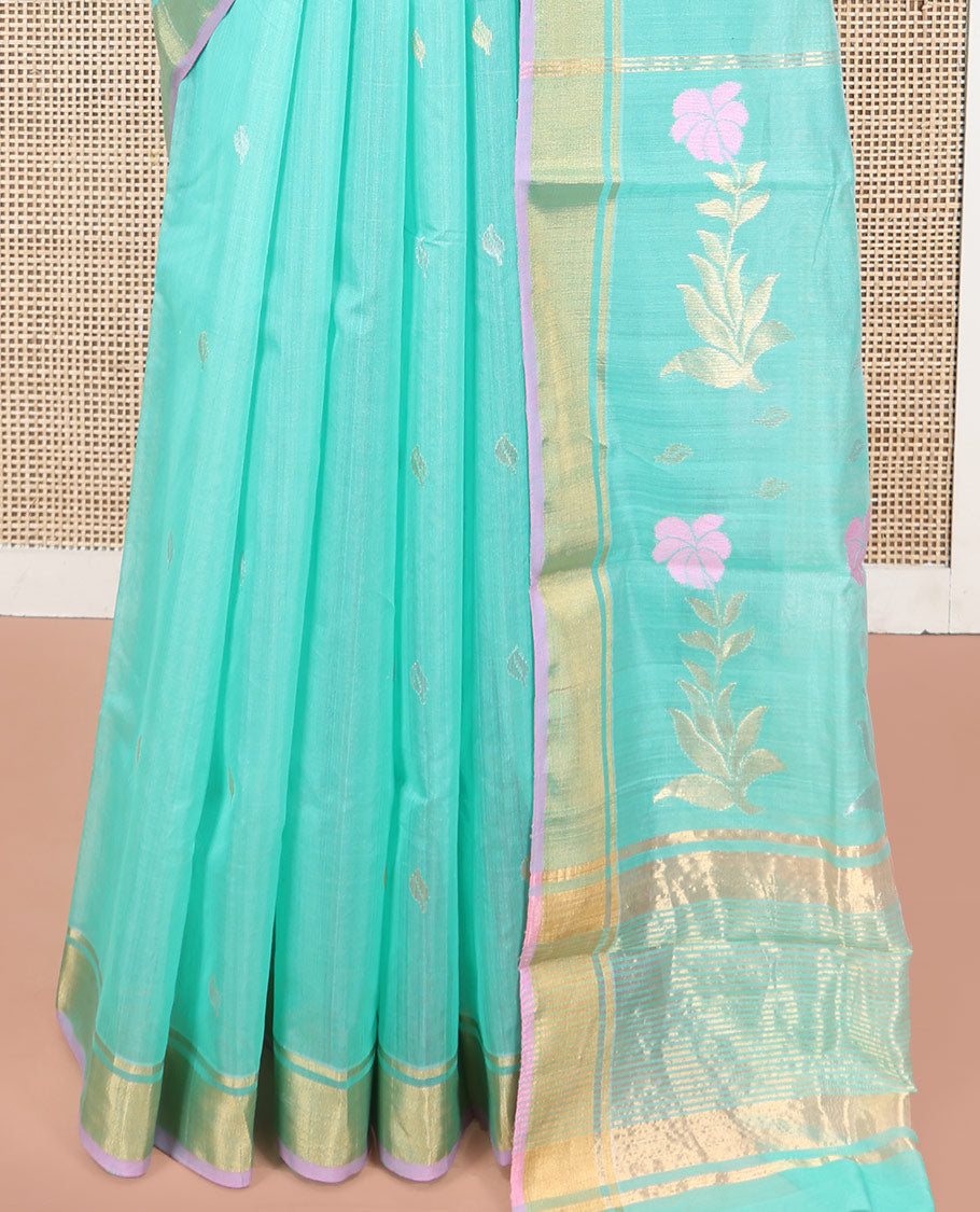 Turquoise Chanderi Cotton Saree, Enthralled with Zari Buttas All Over Its Body, Highlighted by a Zari Border, Pallu of Zari Stripes and Floral Buttas, and Paired with a Matching Blouse