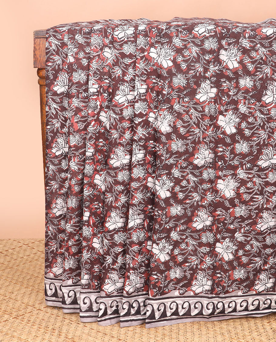 Brown floral design machine printed kalamkari cotton saree with contrast wave design border & floral design pallu