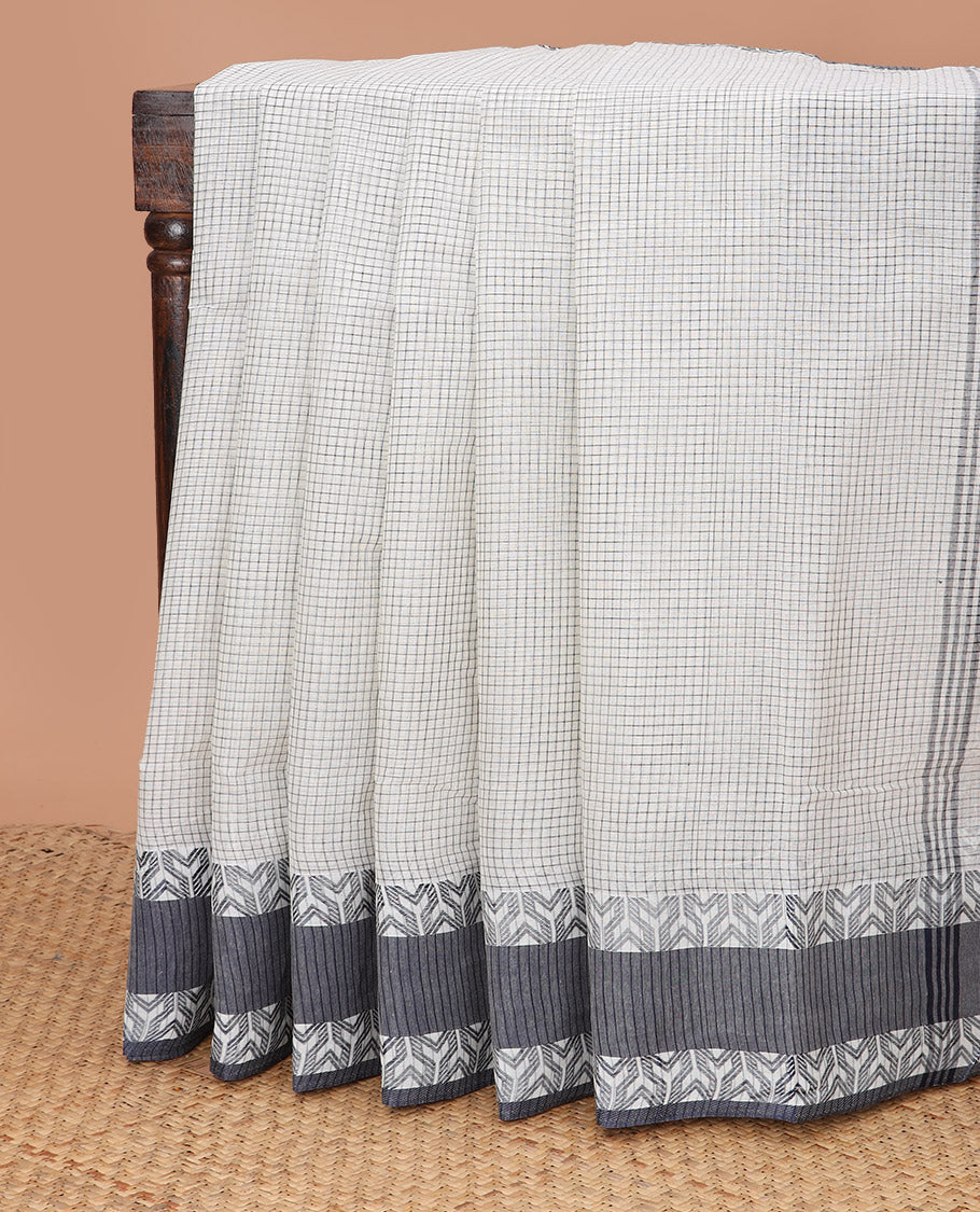 Half-white micro-checked Bengal cotton saree, contrast geometric patterned border, and striped pallu