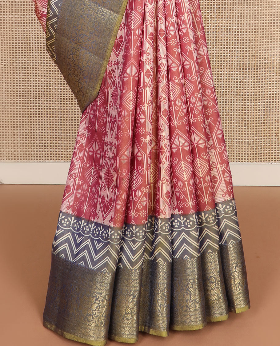 Dark peach intricately designed semi-banaras patola silk saree, contrast floral creeper zari design border, and pallu of chevron and floral designs