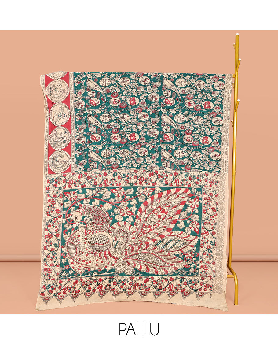 Green Machine-Printed Kalamkari Cotton Saree, Embellished with Flora, Fauna, and Musical Instrument on Its Body, Complemented by a Contrast Round Motifs Printed Border, Pallu of Kalamakri Peacock Print, and Paired with a Printed Blouse