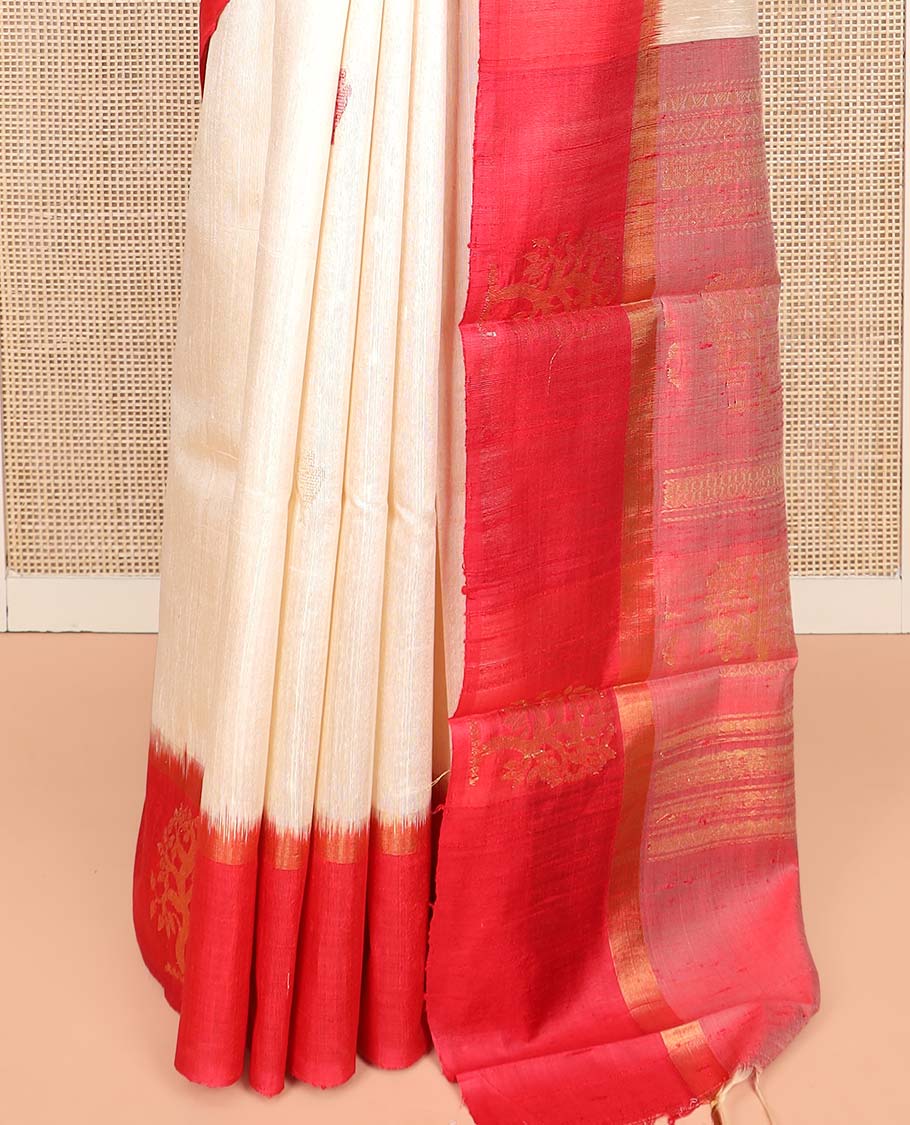 Cream Dupion Silk Saree, Subtly Woven with Buttas on Its Body, Complemented by a Contrast Border of Tree Motifs in Zari, Sparsely Woven Pallu, and Paired with a Contrast Blouse