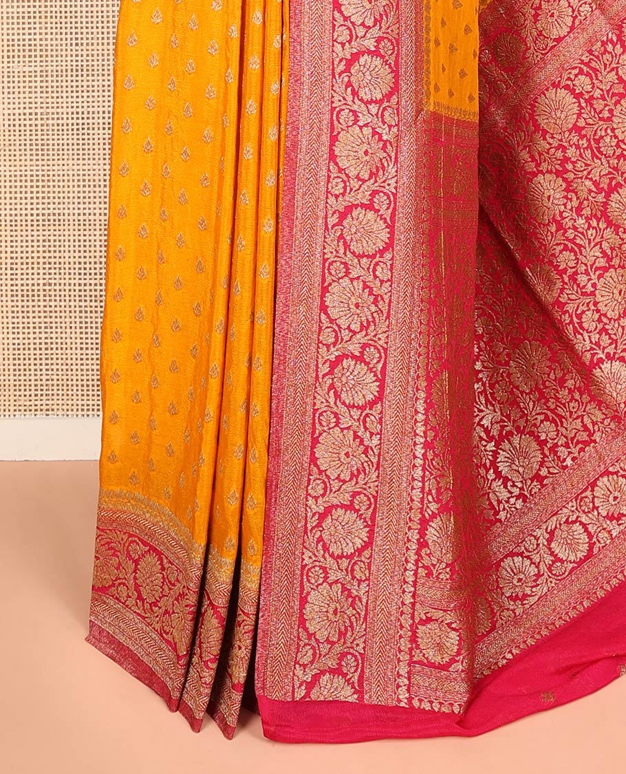 Orange Fancy Georgette Saree Subtly Sparkled with Zari Buttas, Complemented by Contrast Border of Floral Designs, Zari-Rich Pallu of Floral Jaal Designs, and Paired with a Contrast Blouse