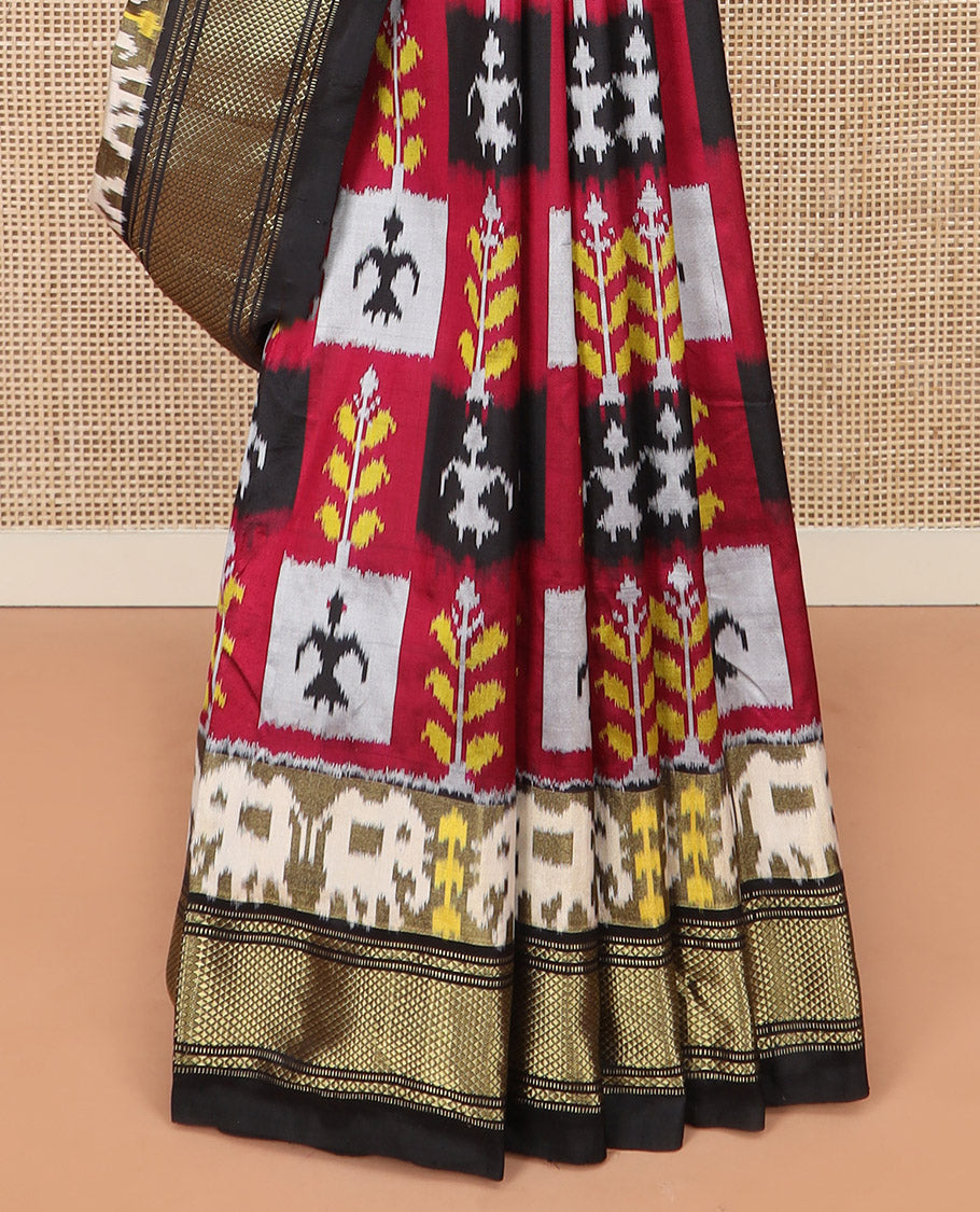 Multi-Colour Ikkat Silk Saree Features Warli Human Buttas and Flower Buttas, a Contrast Border Steeped with Traditional Zari Designs, a Pallu of Diamond Patterns, and a Contrast Blouse