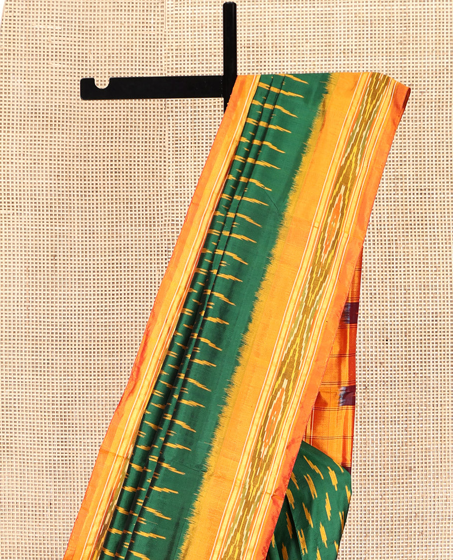 Green Pochampally Ikat Silk Saree, Embellished with Ikat Buttas, Complemented by a Contrast Ikat Border, Ikat-Style Pallu, and No Blouse
