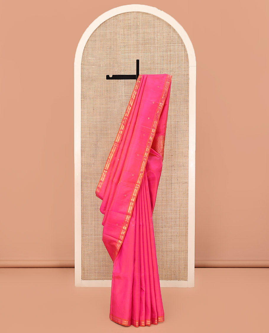 Pink Kanchipuram Silk Saree, Decked Up with Zari Buttas All Over Its Body, Complemented by Contrast Zari Piping Border, Pallu of Big Paisleys, and Paired with a Matching Blouse