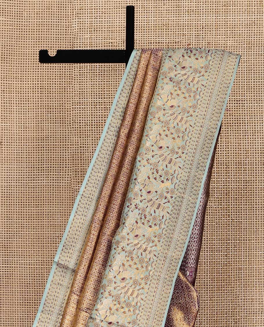Copper Kanchipuram Tissue Silk Saree, Complemented by Contrast Meenakari Floral and Peacock Design Border, Grand Jaal Pallu and Paired with a Contrast Blouse