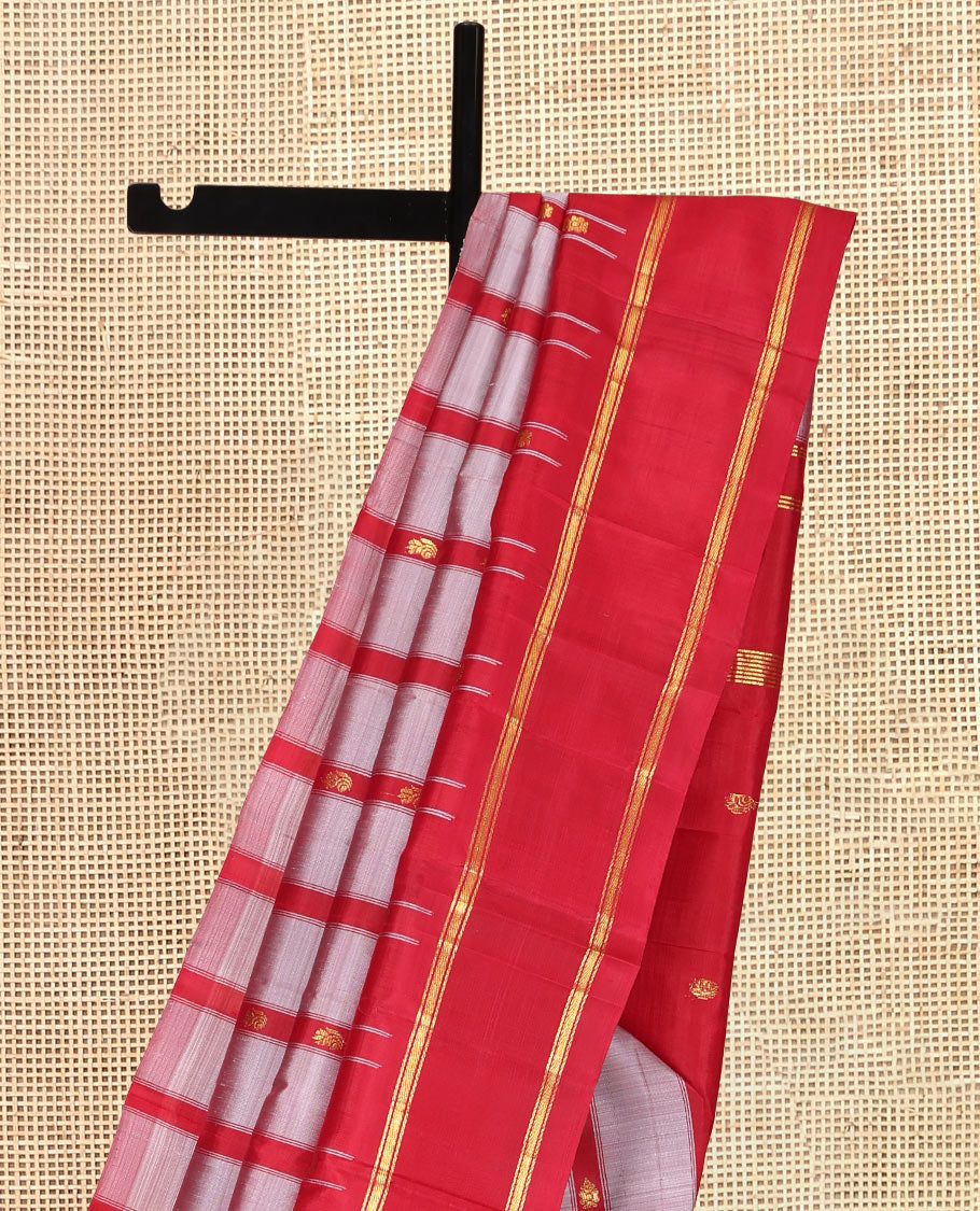 Grey Kanchipuram Silk Saree Featuring Zari Buttas, Complemented by a Contrast One-Sided Thazampoo Rekku Rettai Pettu Border, Zari Design Pallu, and a No Blouse