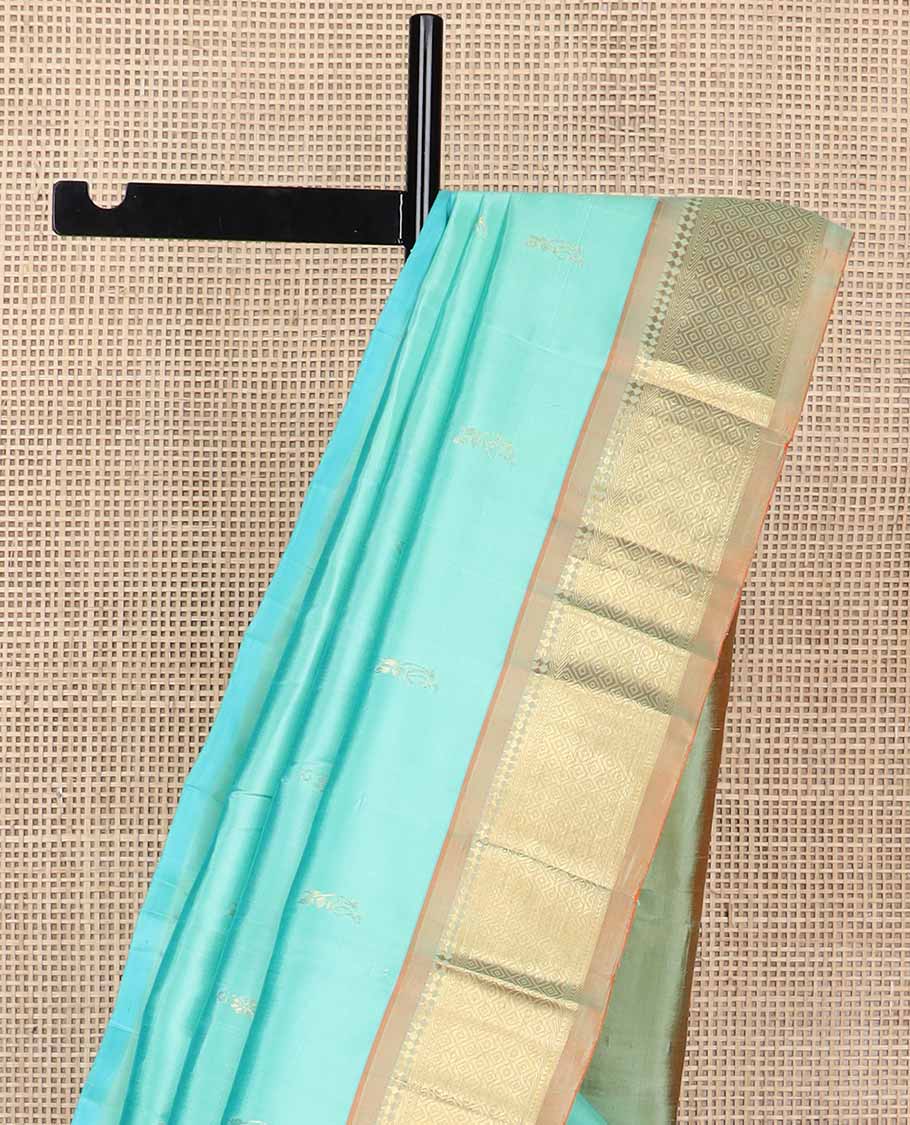 Light blue buttas kancheepuram silk saree with contrast border of rekku, kathir, kuyil kann design & zari design pallu