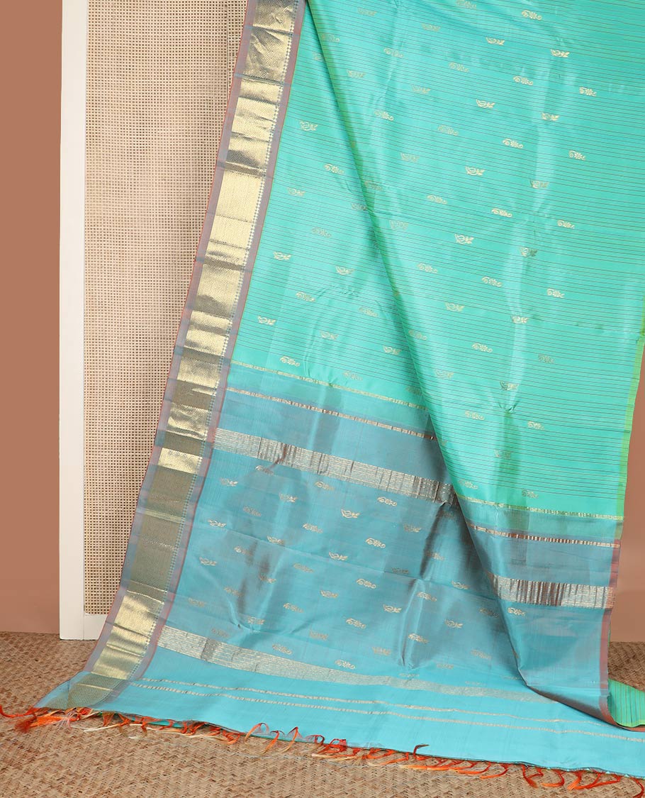 Blue stripes & buttas silk saree, contrast one-sided border of panner sombu, kathir & jaal & zari design pallu