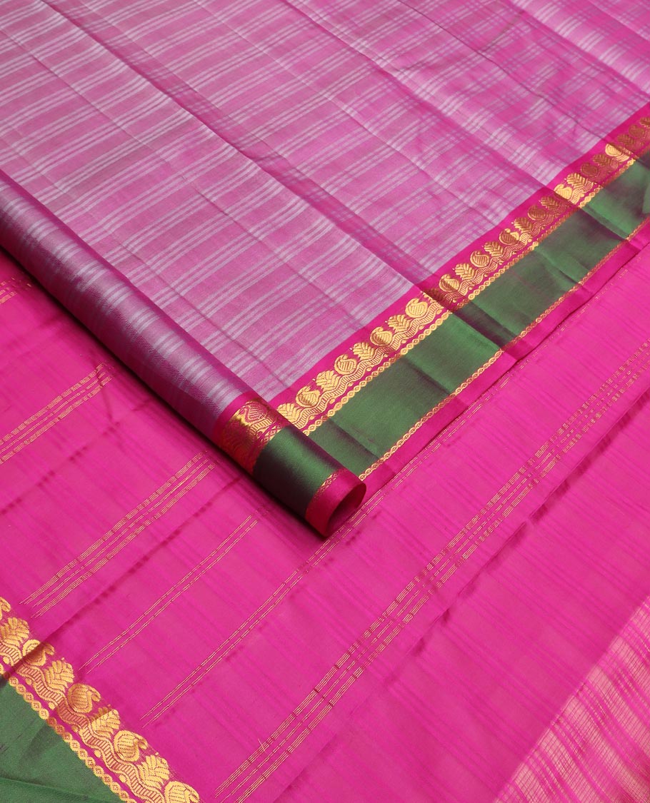 Pink striped Kanchipuram silk saree, contrast rettai pettu border of zari designs, and zari striped pallu