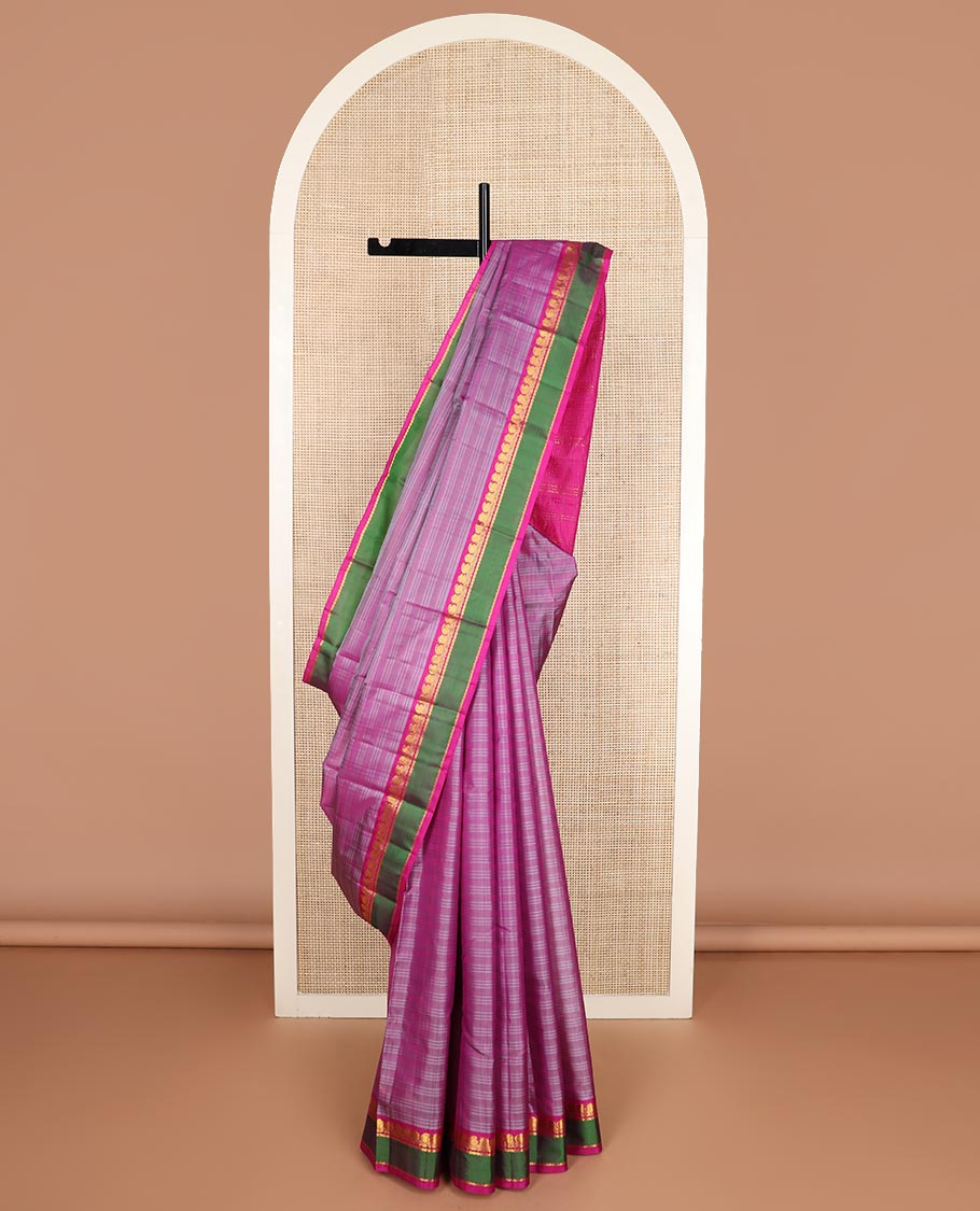 Pink striped Kanchipuram silk saree, contrast rettai pettu border of zari designs, and zari striped pallu