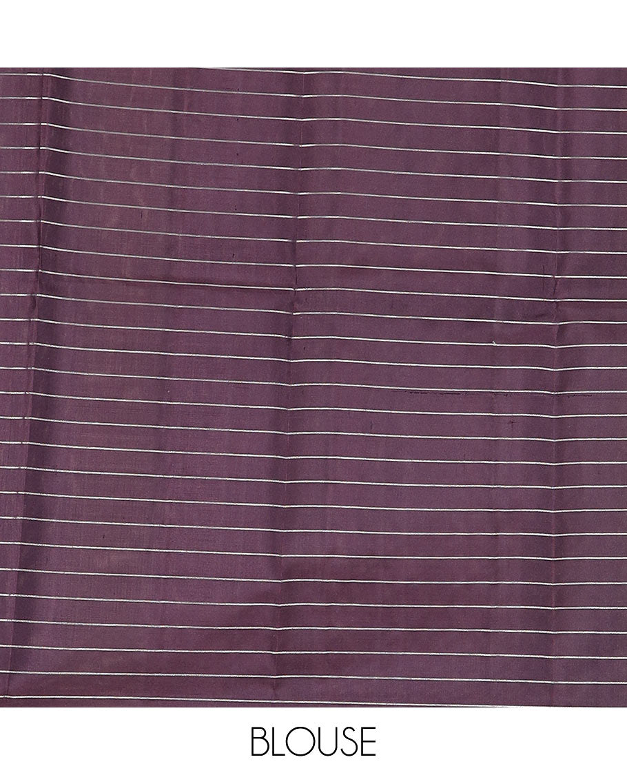 Purple checked Kanchipuram silk saree, contrast border of round-chakram style buttas, and paiyaadi kattam pallu