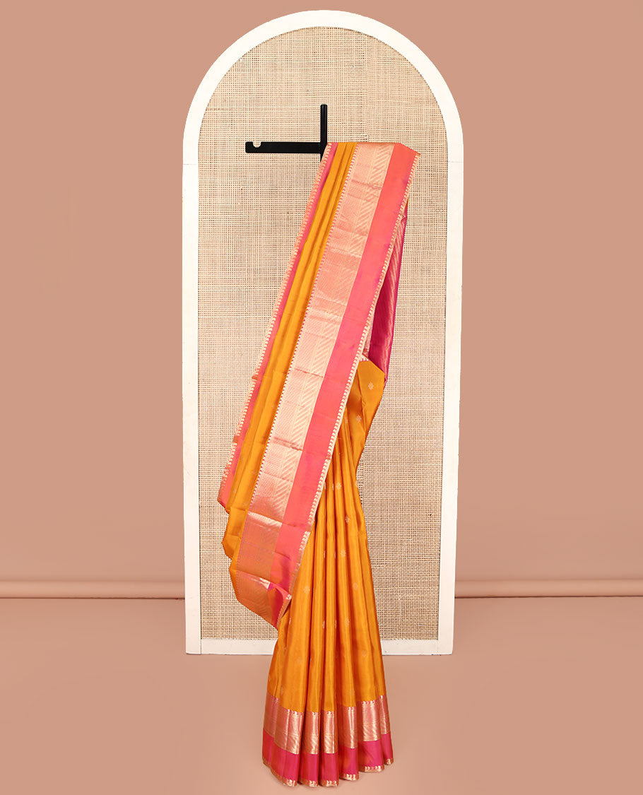 Mango Yellow Kanchipuram Silk Saree, Adorned with Zari Buttas All Over Its Body, Complemented by Contrast Border of Traditional Zari Designs, Grand Diagonal Striped Pallu, and Paired with a Contrast Blouse