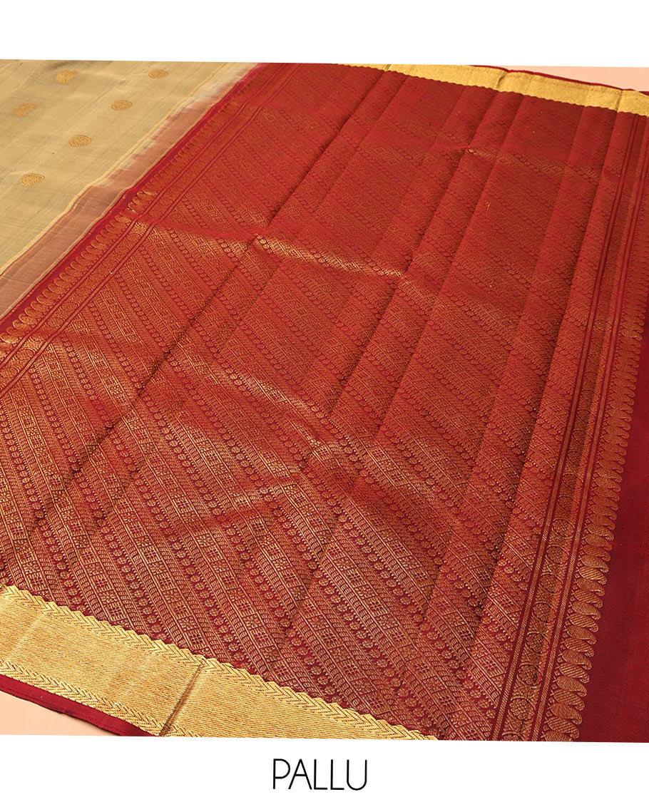 Grey Kanchipuram Silk Saree, Accentuated with Mayil and Chakram Buttas All Over Its Body, Complemented by Contrast Border of Rekku and Kathir Designs, Grand Pallu of Traditional Designs, and Paired with a Contrast Blouse