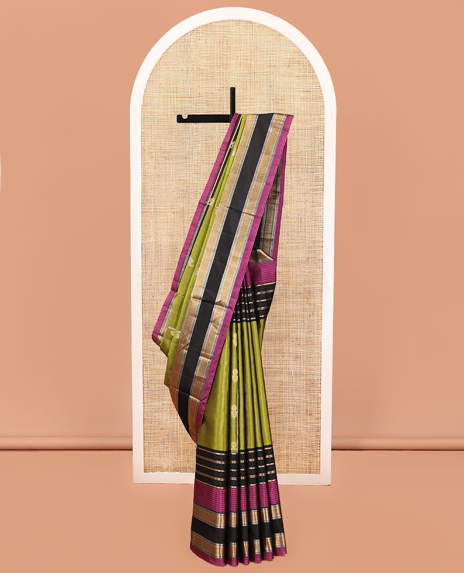 Green Mayuri Soft Silk Saree, Woven with Zari Buttas All Over Its Body, Complemented by a Contrast Border of Traditional Zari Designs, Pallu of Vanki Designs, and Paired with a Contrast Blouse