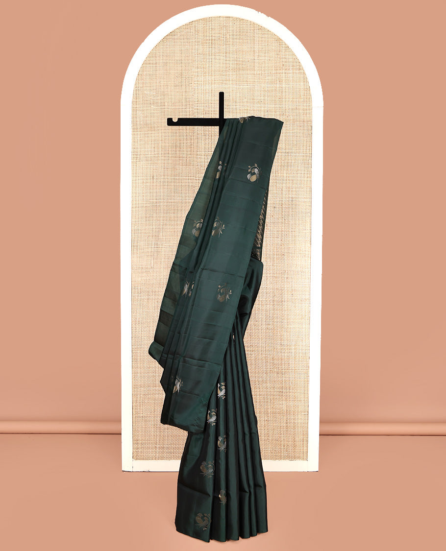 Borderless Green Mayuri Lite Silk Mix Saree, Detailed with Bird Buttas All Over Its Body, Highlighted by a Zari Pallu of Diagonal Stripes and Chakram Designs, and Paired with a Matching Blouse