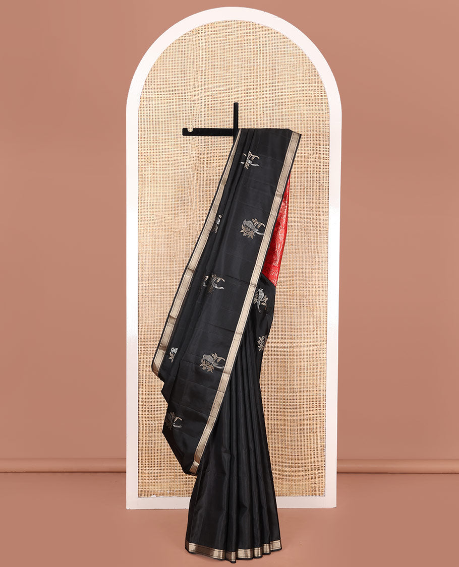 Black Mayuri Soft Silk Saree, Accentuated with Bird Buttas All Over Its Body, Subtle Zari Piping Border, Complemented by Contrast Pallu of Floral-Bird Jaal Designs, and Paired with Contrast Blouse