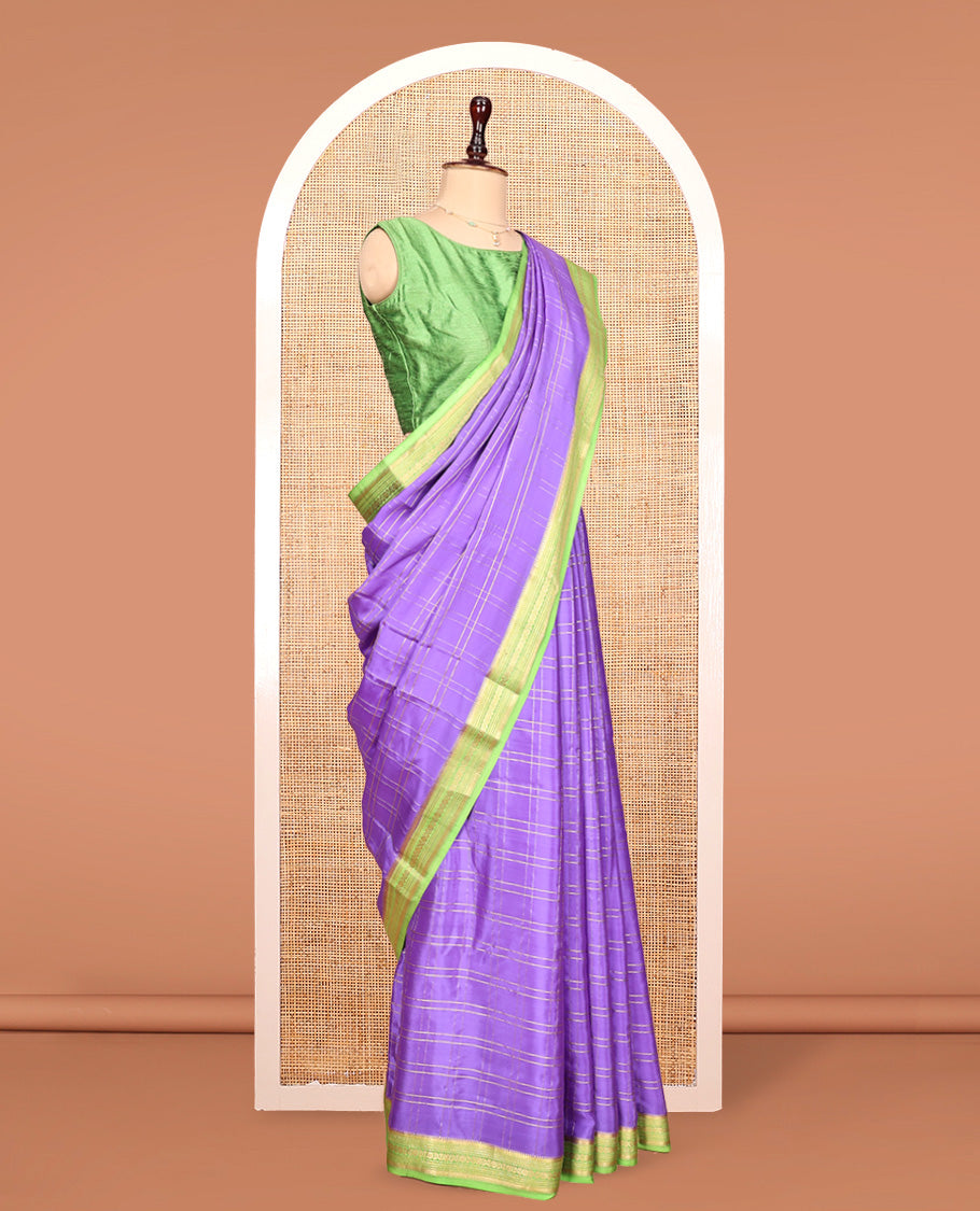Lavender Mysore Silk Saree, Gleamed Up with Zari Checked Designs, Complemented by a Contrast Traditional Zari Design Border, Pallu Steeped with Zari Stripes, and Paired with a Contrast Blouse
