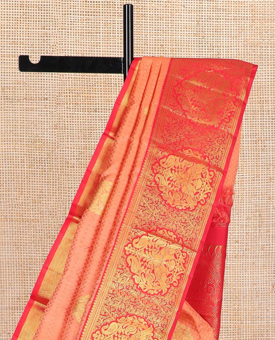 Peach jaal design silk saree with contrast border of thilakam mokku, muthu, banaras designs & floral design pallu