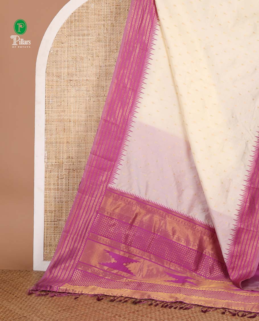 Cream with purple temple butta kanchi silk saree with temple, traditional zari border & rich weaving pallu along with butta design blouse