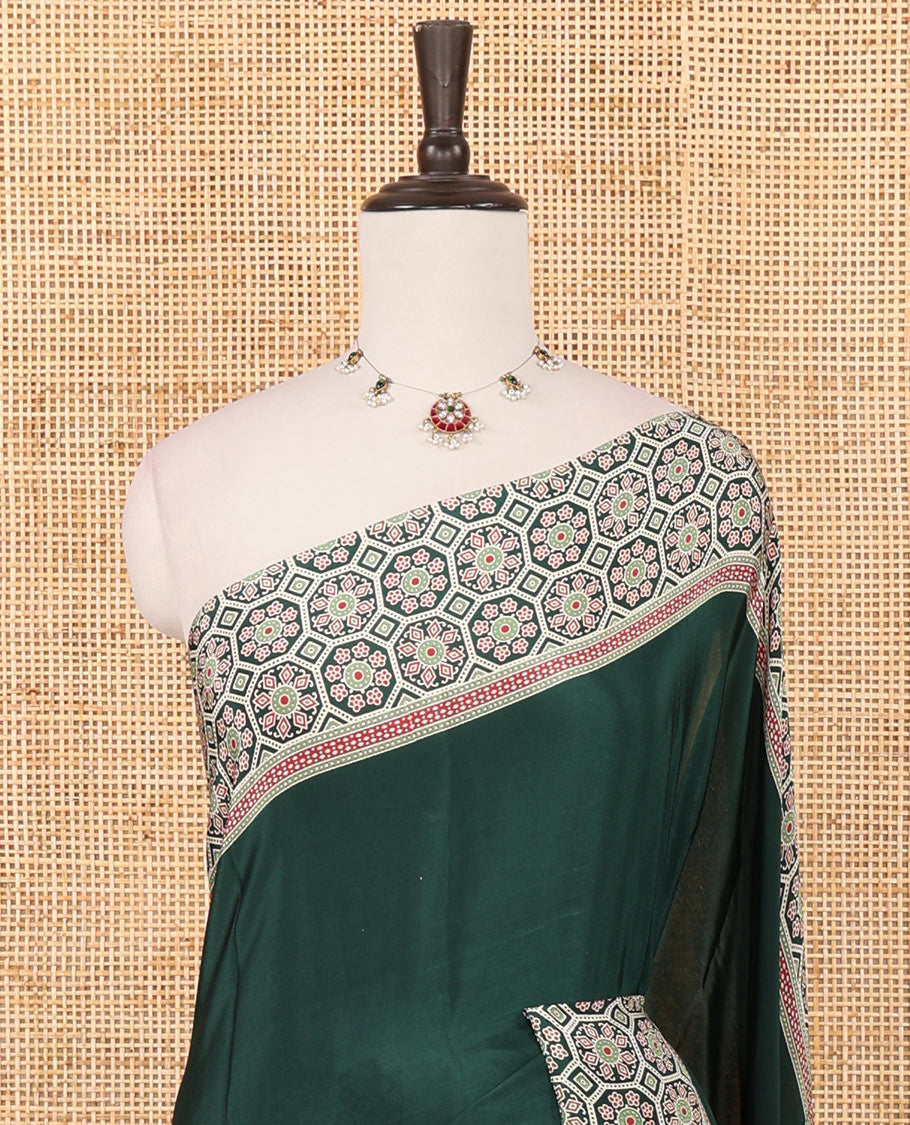 Bottle green plain modal satin saree, double-sided border & pallu intricately printed ajrakh-style design, ajrakh printed blouse