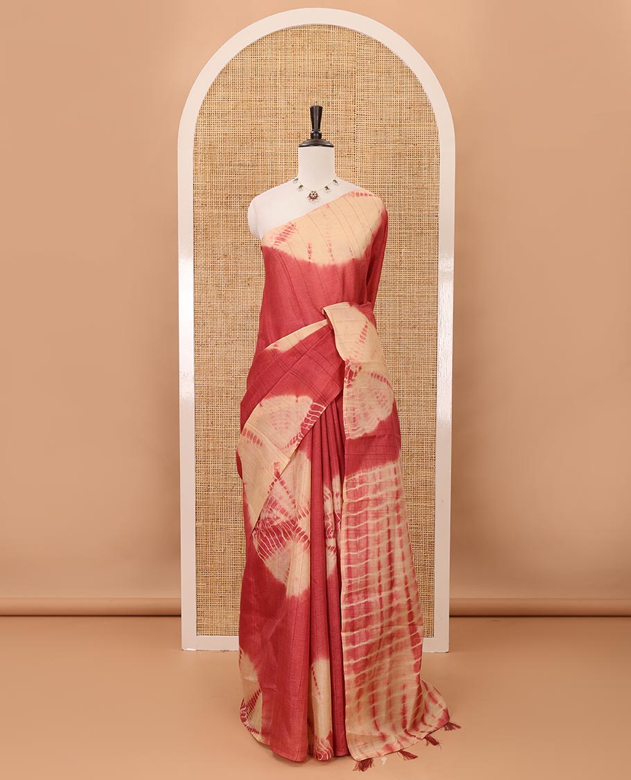Borderless maroon shibori-printed jute tussar silk saree, contrast shibori-printed pallu & contrast blouse