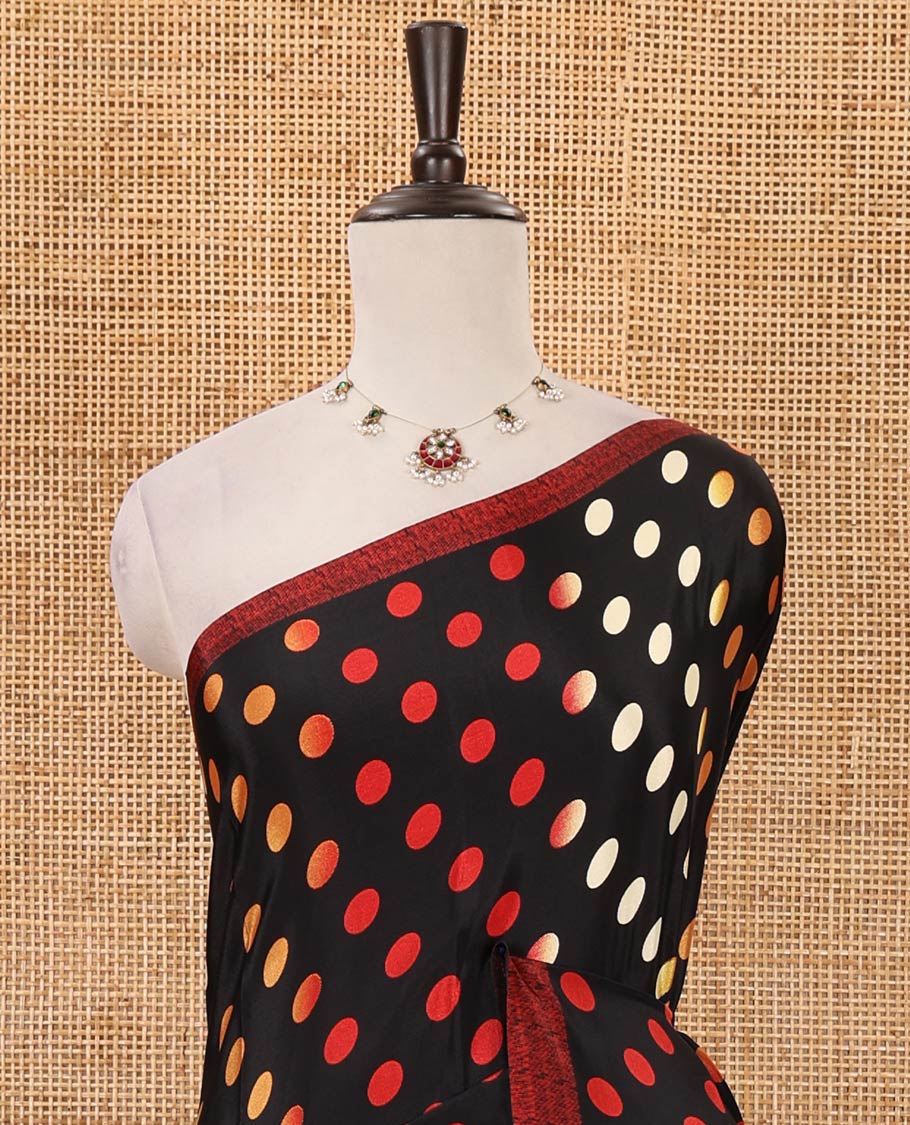 Black colorful polka dots printed satin crepe saree, contrast piping border, stripes printed pallu & contrast printed blouse