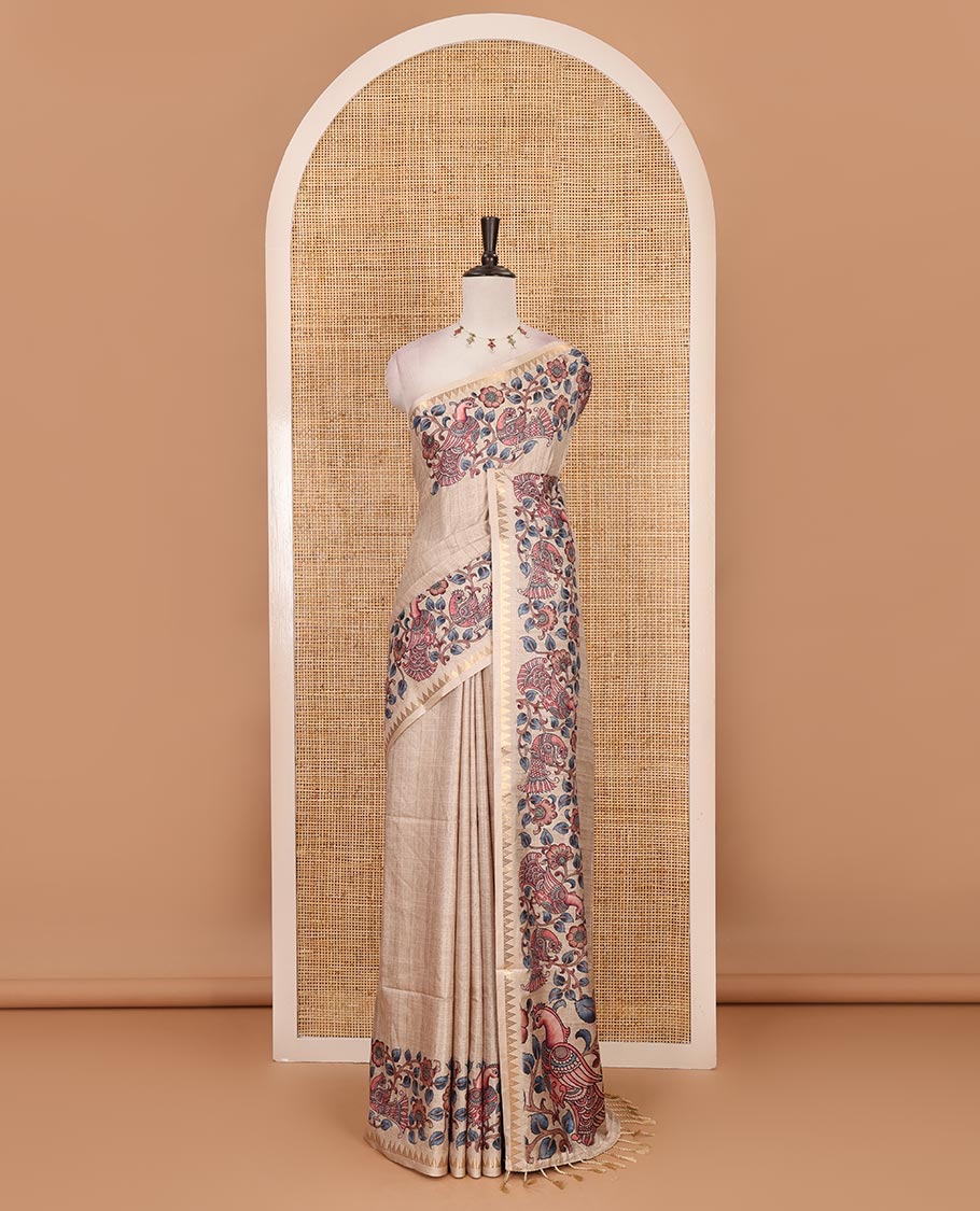Half-white full-plain katan silk saree, double-side kalamkari floral vine and bird printed temple zari border and matching floral vine printed blouse