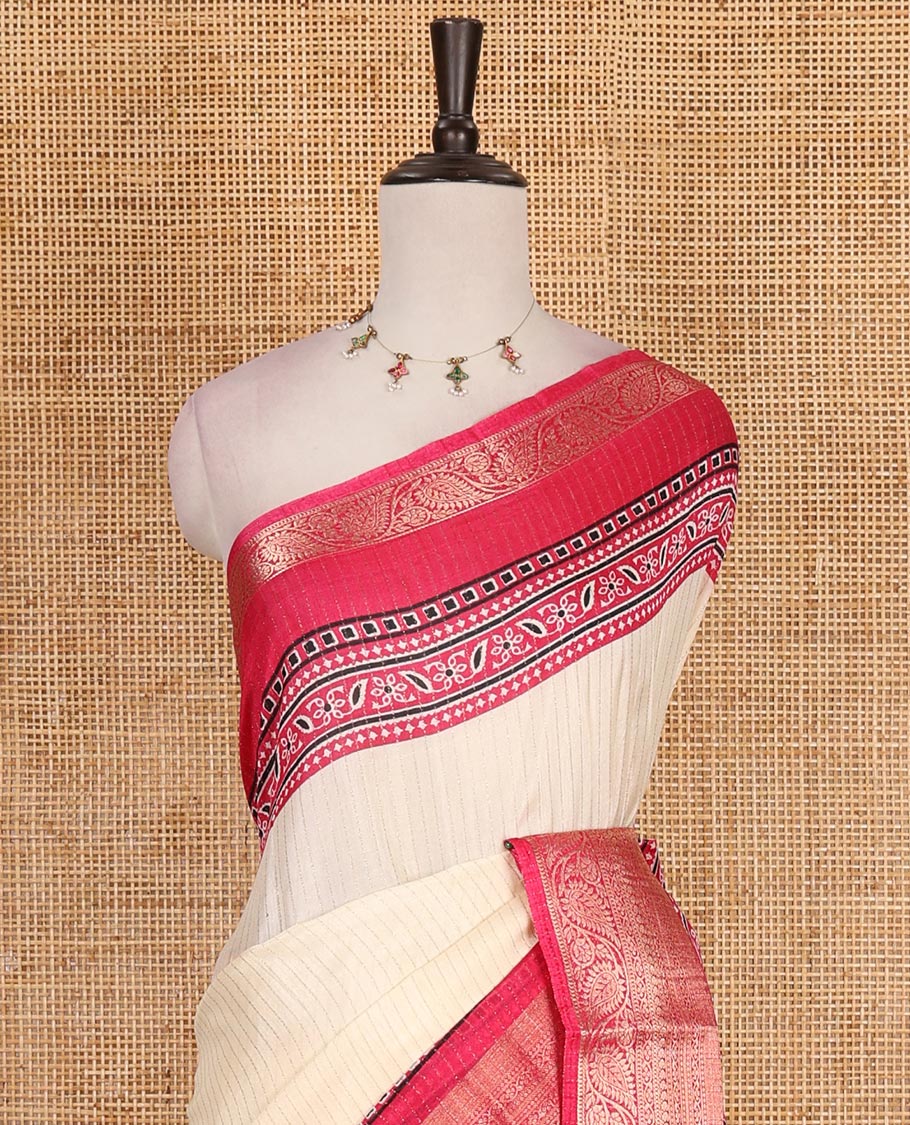 Cream-rani pink zari striped dola silk saree, contrast traditional zari border of leaf creeper, Ajrakh printed pallu, and Ajrakh printed blouse