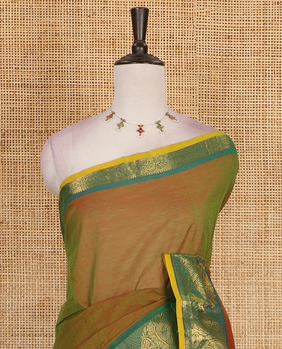 Green plain Chettinad cotton saree, contrast annam and rudraksham motifs zari border, striped pallu, and plain blouse