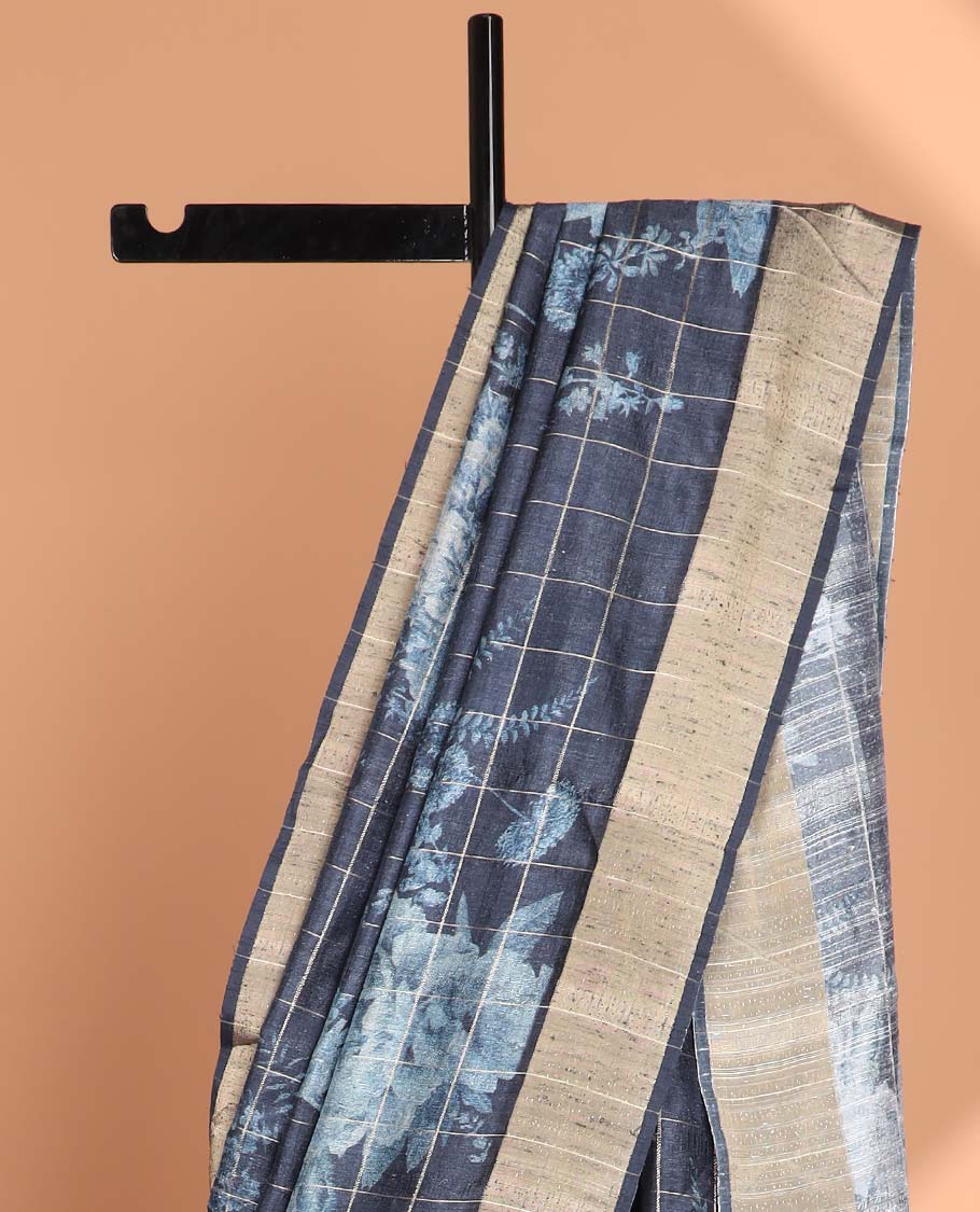 Navy blue checks with floral printe semi tussar saree, gold zari bawanchi border & printed pallu along with checked blouse