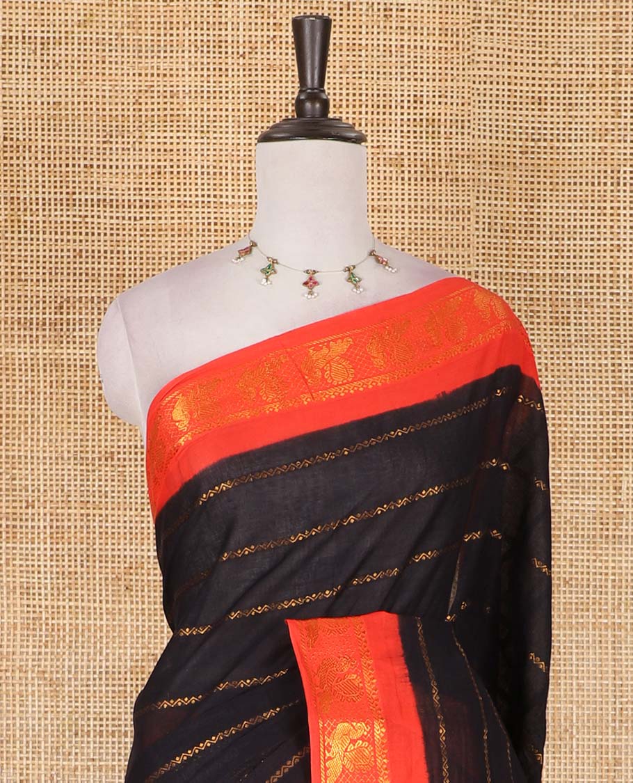 Black veldhari zari striped Sungudi cotton saree, contrast peacock zari motif border, zari striped pallu, and contrast zari design blouse