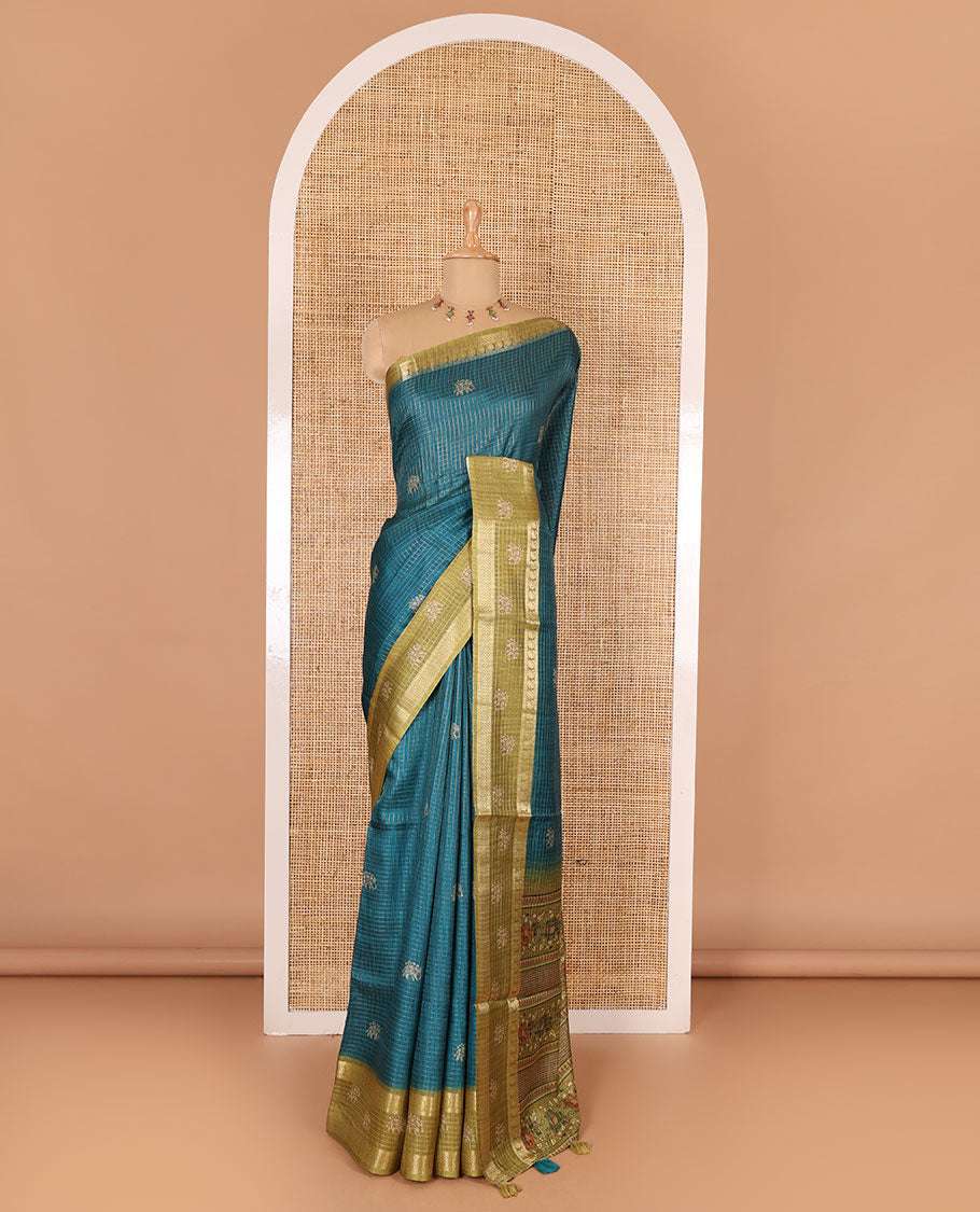 Peacock green zari checked and elephant buttas saree with contrast traditional zari border of elephant print, floral vine printed pallu, and a contrast floral vine printed blouse