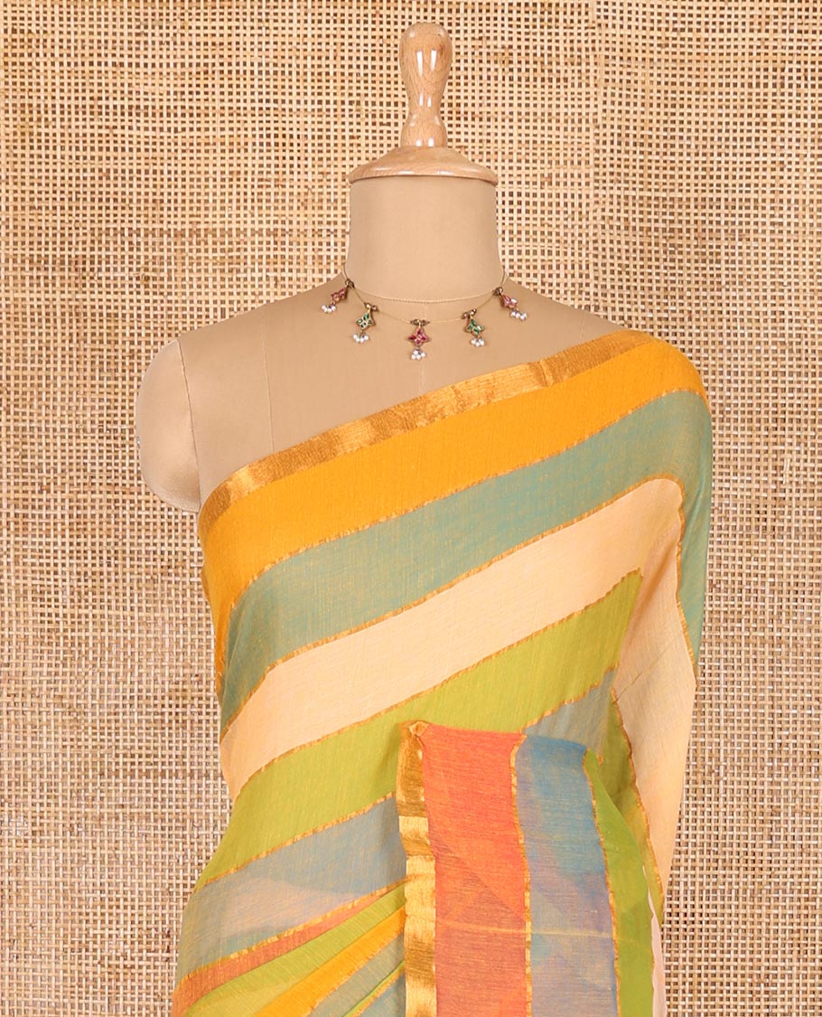 Cream rainbow-style striped Khadi mul cotton saree with piping zari border, and a matching zari striped blouse