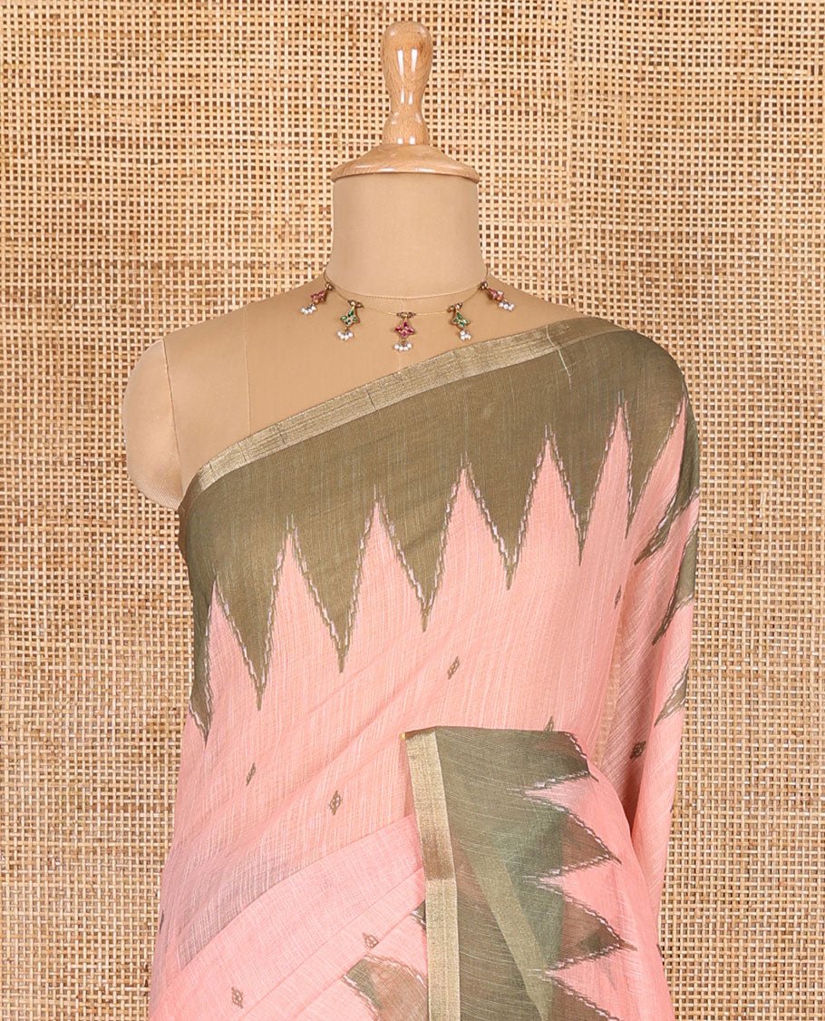 Peach small thread buttas linen cotton saree, contrast temple zari piping border, striped pallu and a contrast blouse