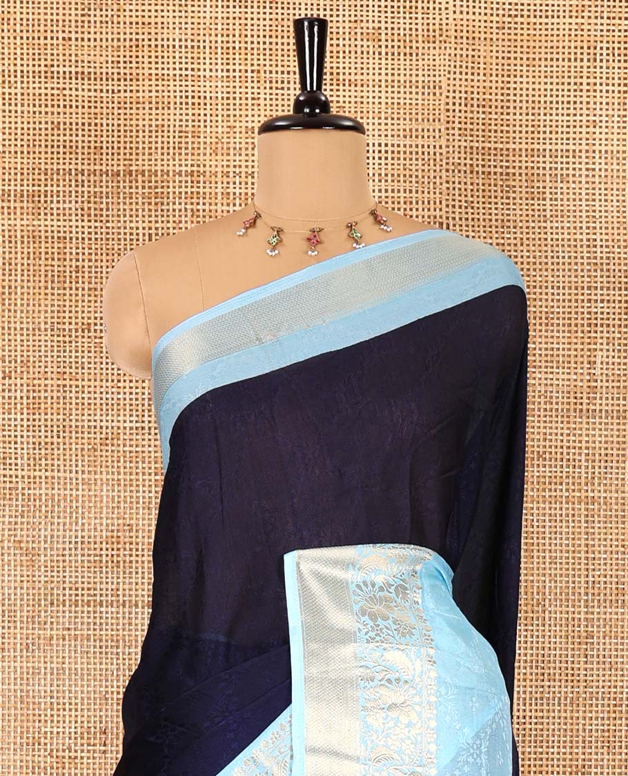 Navy blue embossed moss chiffon saree, contrast embossed with traditional zari border, jaal pallu, and a contrast blouse