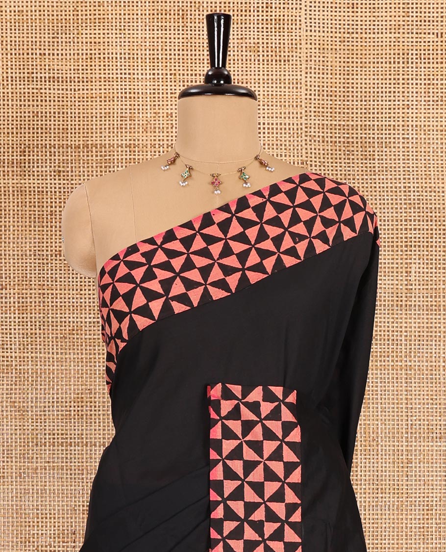 Black plain South cotton saree, triangle grid block printed border, block printed pallu, and a block printed blouse