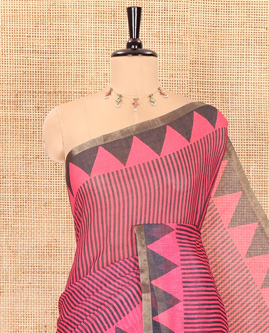 Pink vertical stripes printed linen cotton saree, a temple-printed border, big polka dot printed pallu, and a printed blouse