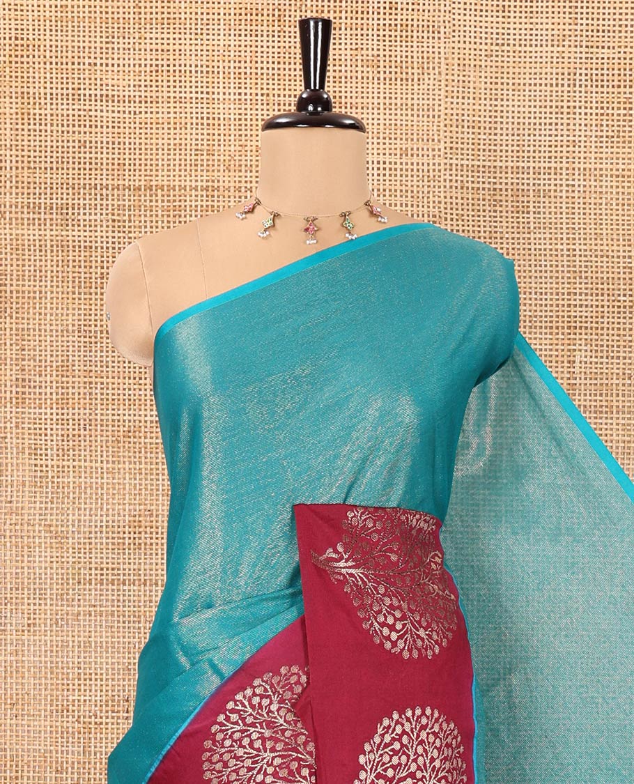 Rama Blue Tissue-Cotton Blended Saree, Subtly Sparkled with Vertical Stripes on Its Body, Complemented by Contrast Border of Tree Motifs Woven, a Pallu Steeped with Zari Stripes, and Paired with a Contrast Blouse