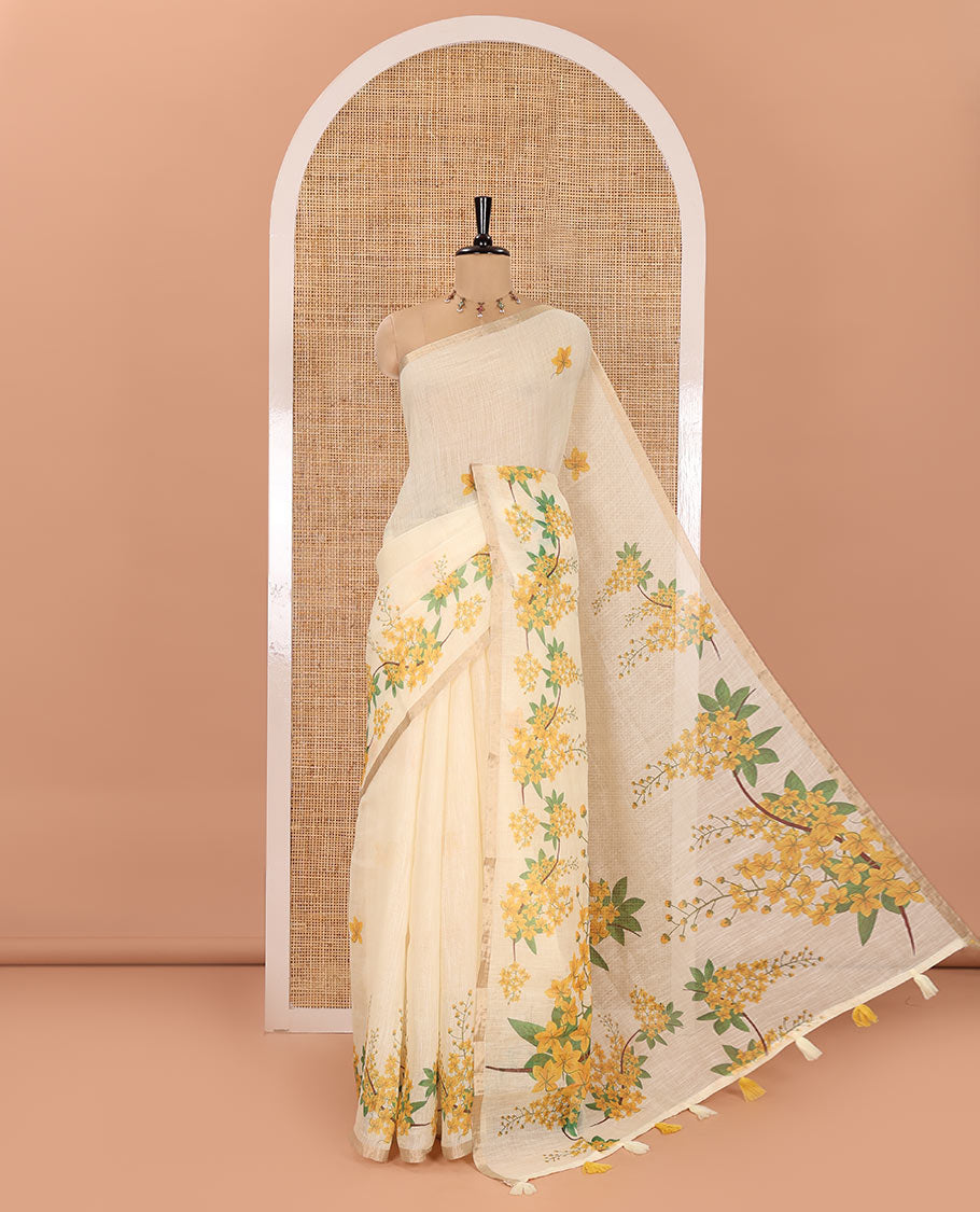 Cream Linen Saree, Elegantly Printed with Averrhoa Carambola-Style Floral Motifs, Subtle Piping Border, Pallu Mirrors the Same Print, and Paired with a Matching Blouse