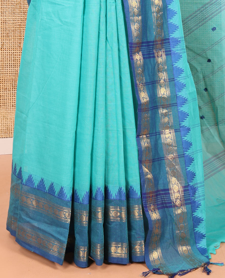 Rama Chettinad Cotton Saree, Subtly Decked up with Thread Buttas All Over Its Body, Complemented by a Contrast Temple Rettai Pettu Traditional Zari Design Border, Pallu of Stripes and Buttas, and Paired with a Matching Blouse