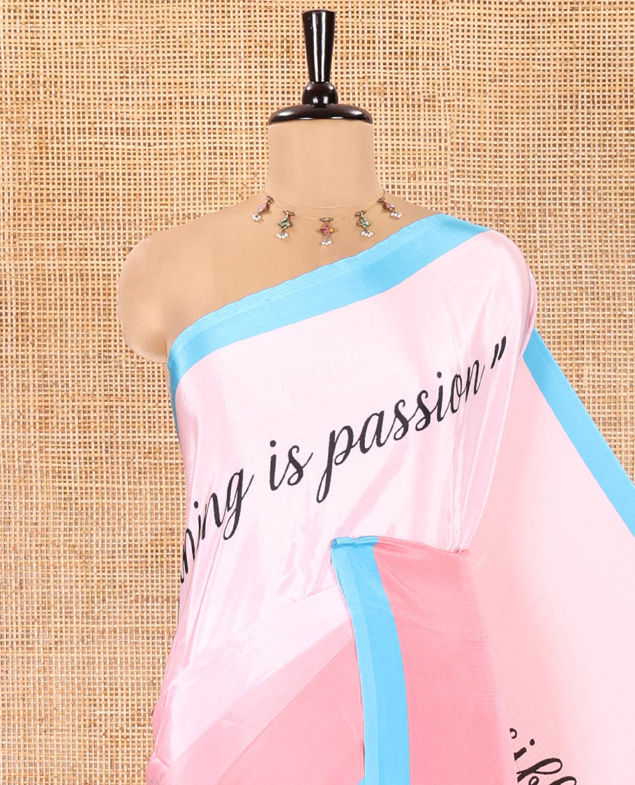 Pink Satin Crepe Saree, Uniquely Printed with Calligraphy Print, Complemented by Contrast Border, Pallu of Human Figurines Print, and Paired with a Contrast Blouse