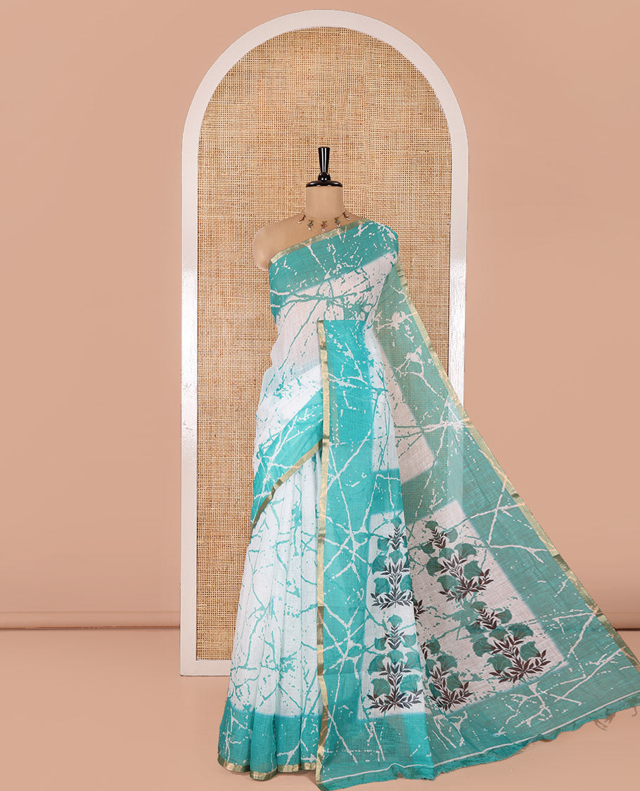 Cream and Rama Linen Cotton Saree, Decorated with Batik Print on Its Body, Complemented by Contrast Batik Printed Border, Pallu of Floral Print, and Paired with a Contrast Blouse