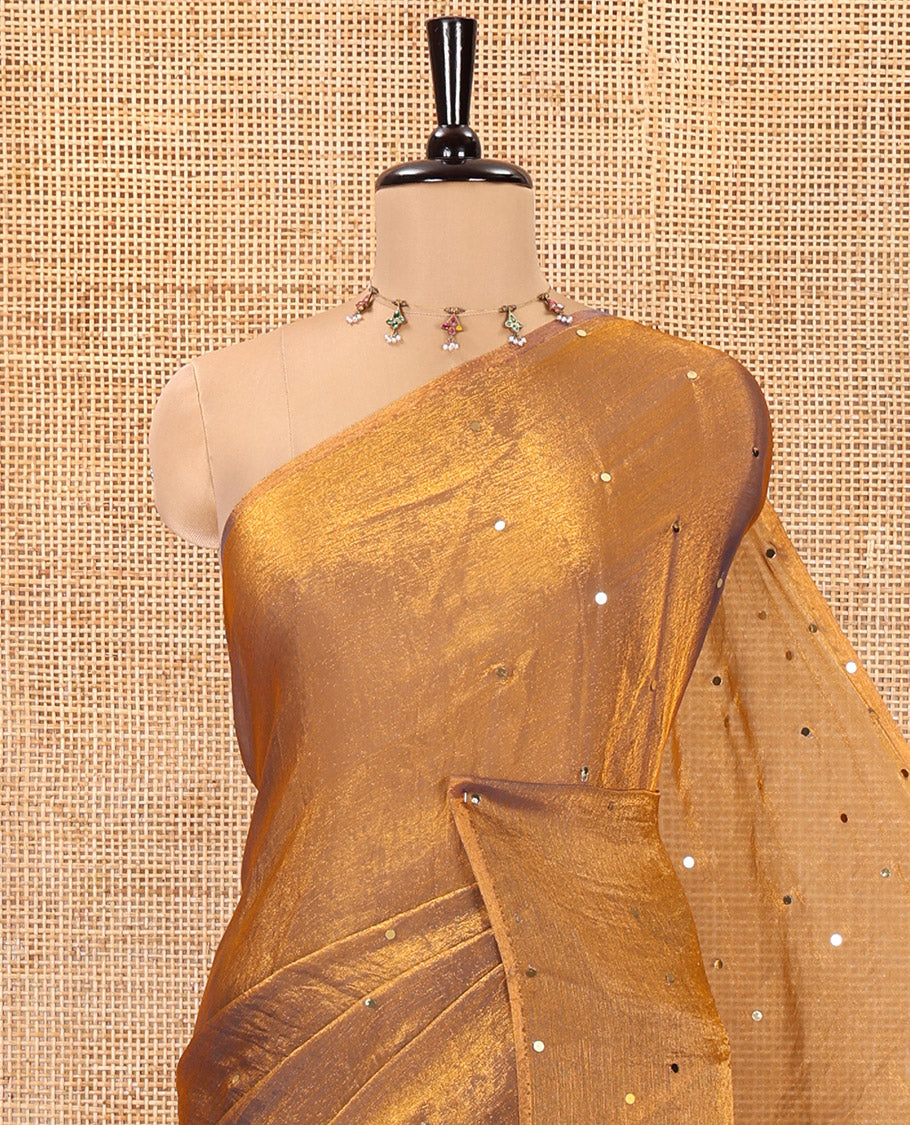Borderless Copper Gold Fendy Chiffon Saree, Gleamed Up with Sequin Work on Its Body, Highlighted by a Self-Pallu of Sequin Work, and Paired with a Matching Blouse