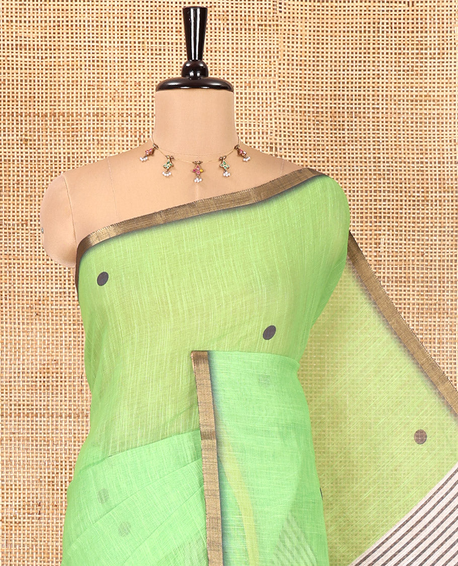 Parrot Green Linen Cotton Saree, Adorned with Half-And-Half-Style Polka Dots, a Subtle Piping Border, Contrast Vertically Striped Pallu, and a Contrast Blouse