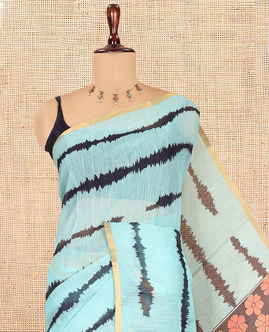Sea Green Linen Cotton Saree, Adorned with Shibori Print, a Zari Piping Border, Floral-Peacock Motif Printed Pallu, and Matching Blouse