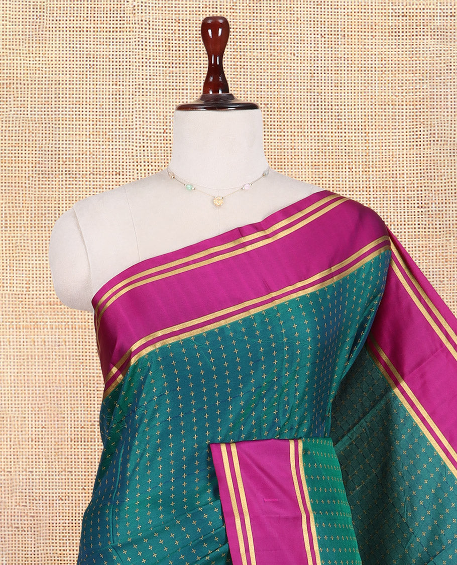 Peacock Green Semi-Soft Silk Saree Steeped with Plus-Shaped Buttas, Contrast Border, and a Matching Blouse