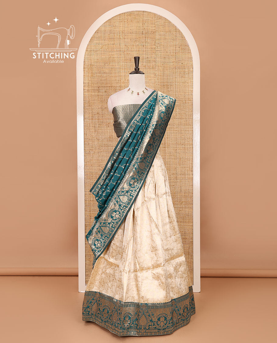 Cream-ramar blue semi-banaras half-saree, floral jaal jacquard & contrast traditional zari border skirt, floral jacquard blouse & contrast zari design blouse