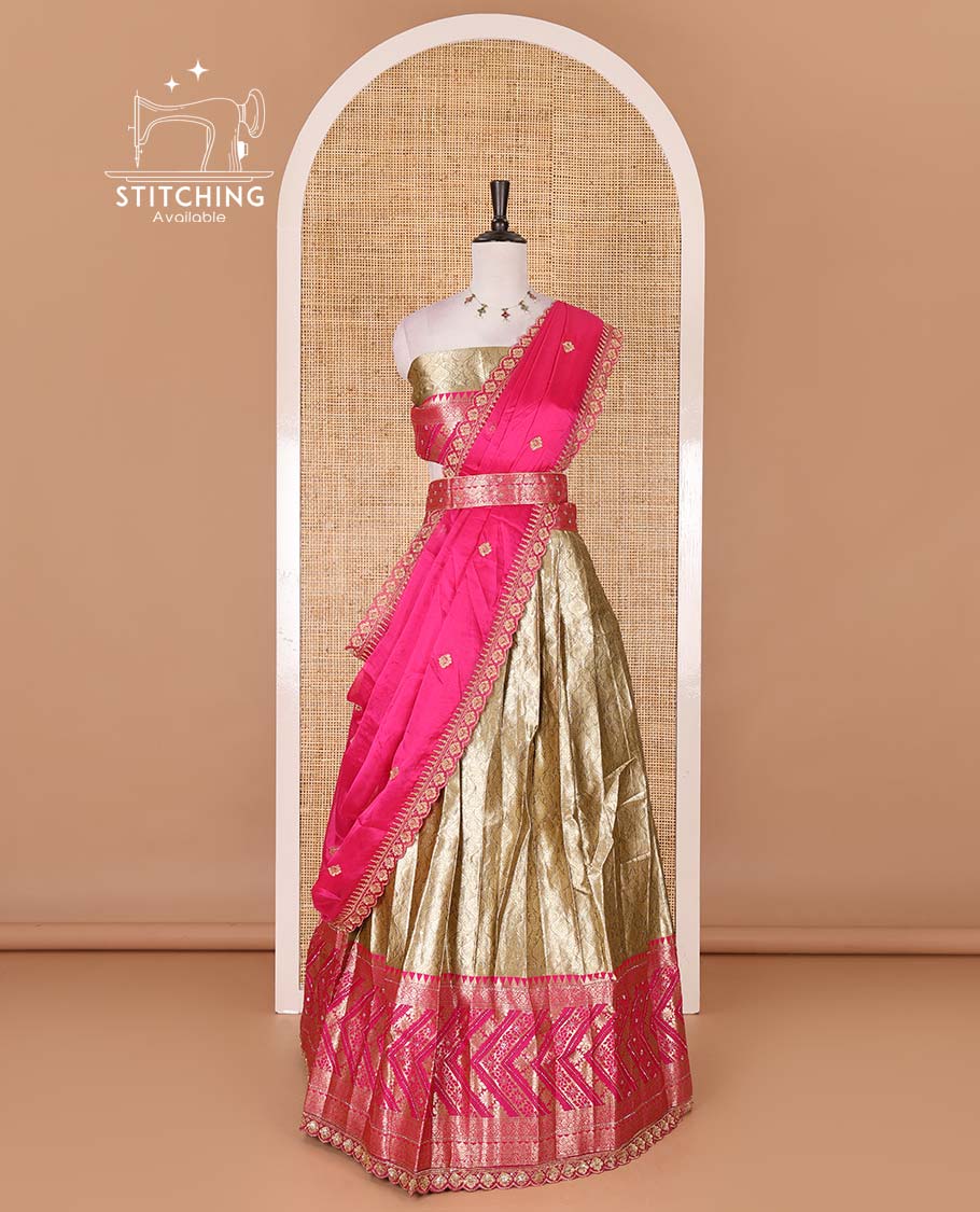 Gold banaras half saree, ogee skirt, contrast rani pink traditional zari border, matching blouse, and Syska georgette embroidered dhavani